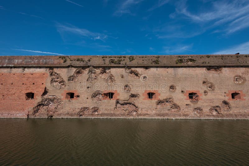 Damaged Wall and Moat at Fort Pulaski stock image Damaged Wall and Moat at Fort Pulaski stock image