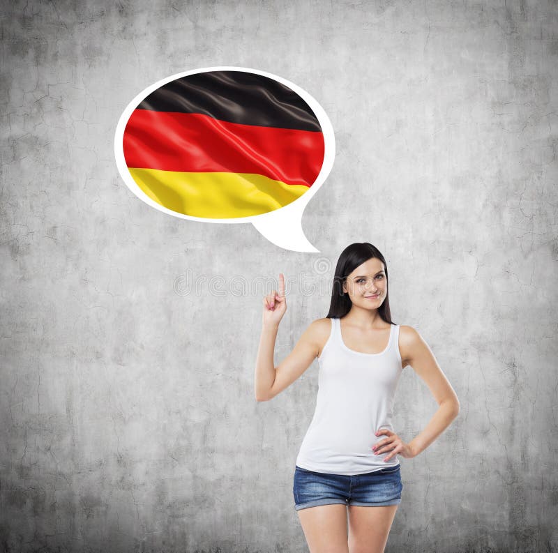 Dame unterstreicht die Gedankenblase mit Deutschland-Flagge nach innen Konkreter Hintergrund stockfotos Dame unterstreicht die Gedankenblase mit Deutschland-Flagge nach innen Konkreter Hintergrund stockfotos