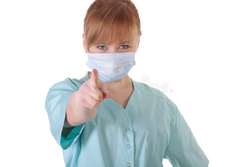 Damendoktor mit dem Respiratoraufstellungs- und -showfinger auf Ihnen lizenzfreie stockbilder Damendoktor mit dem Respiratoraufstellungs- und -showfinger auf Ihnen lizenzfreie stockbilder