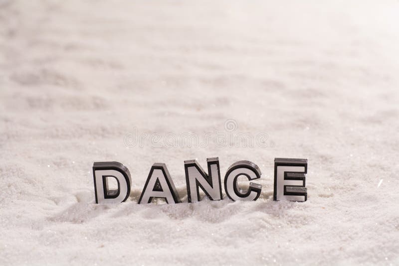 Dance word on white sand