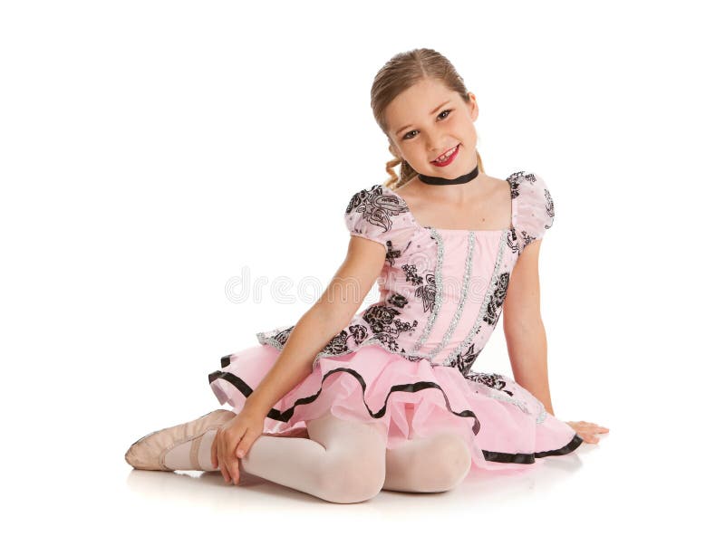 Dancer: Cute Ballet Dancer Sits on the Floor stock image Dancer: Cute Ballet Dancer Sits on the Floor stock image