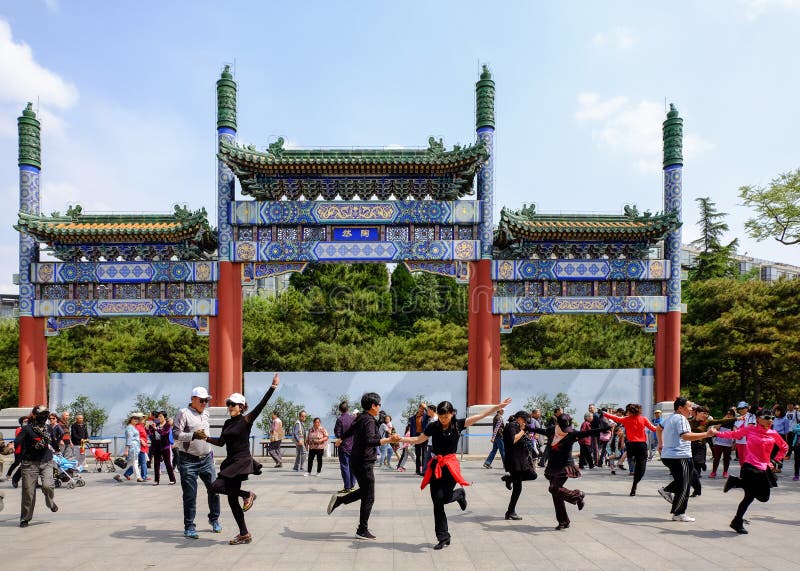 Dancing people in a park. Taoranting Park is a city park inBeijing, China.