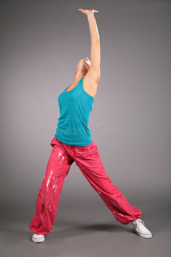 Dancing woman in sportswear