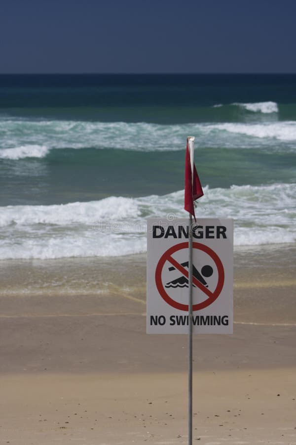 Danger stock photo. Image of sand, dangerous, flag, wave - 12397002