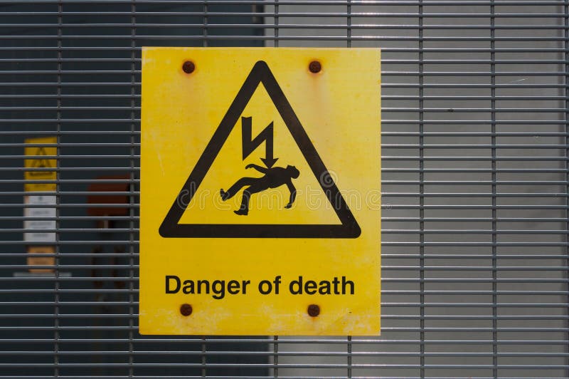 Danger High Voltage risk of Death sign royalty free stock photography