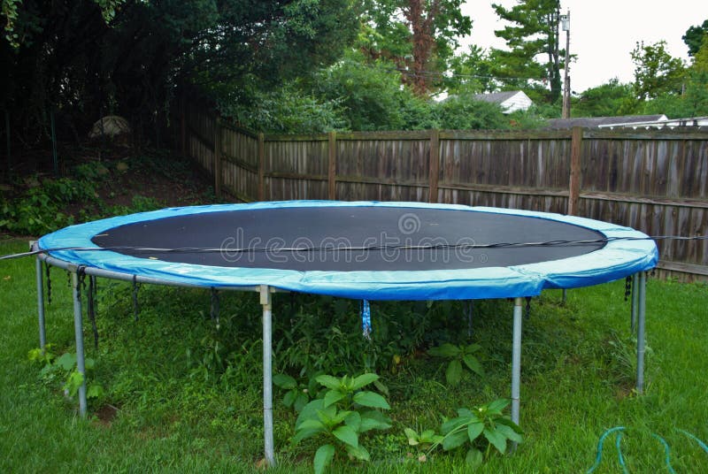 Storm Damage Tree and Trampoline Stock Photo Image of service, advice