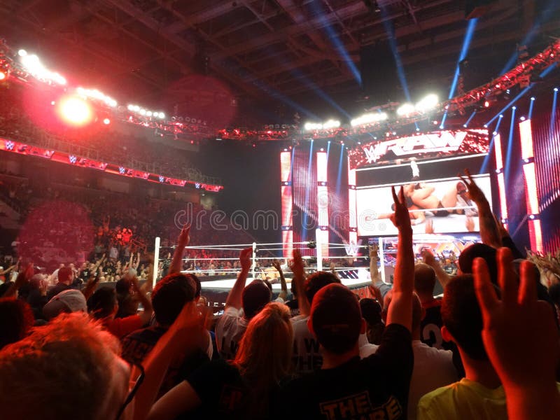 SAN JOSE - MARCH 30: Daniel Bryan pins Dolph Ziggler in middle of ring as crowd counts pin holding up two fingers during intercontinental title match during live taping of WWE Monday Night Raw at the SAP Center in San Jose, California on March 30, 2015. SAN JOSE - MARCH 30: Daniel Bryan pins Dolph Ziggler in middle of ring as crowd counts pin holding up two fingers during intercontinental title match during live taping of WWE Monday Night Raw at the SAP Center in San Jose, California on March 30, 2015.