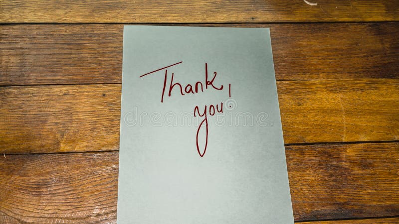 Thank you, writing love text on paper, lovely message. Romantic, love concept. Valentine`s day. Thank you, writing love text on paper, lovely message. Romantic, love concept. Valentine`s day