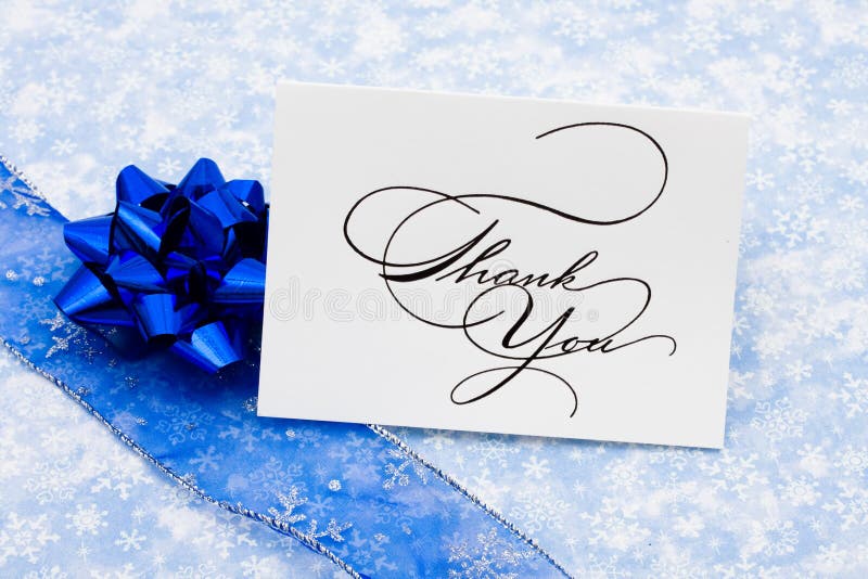 Thank you card with ribbon and bow on blue snowflake background, thank you card. Thank you card with ribbon and bow on blue snowflake background, thank you card