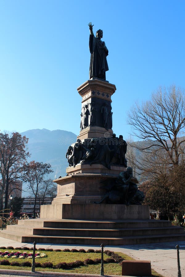 Dante Monument in Trento, Italy. Popular touristic european destination. Trento city view. Dante Monument in Trento, Italy. Popular touristic european destination. Trento city view