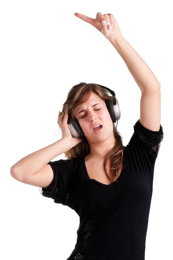 Woman dancing using headphones isolated in a white background. Woman dancing using headphones isolated in a white background