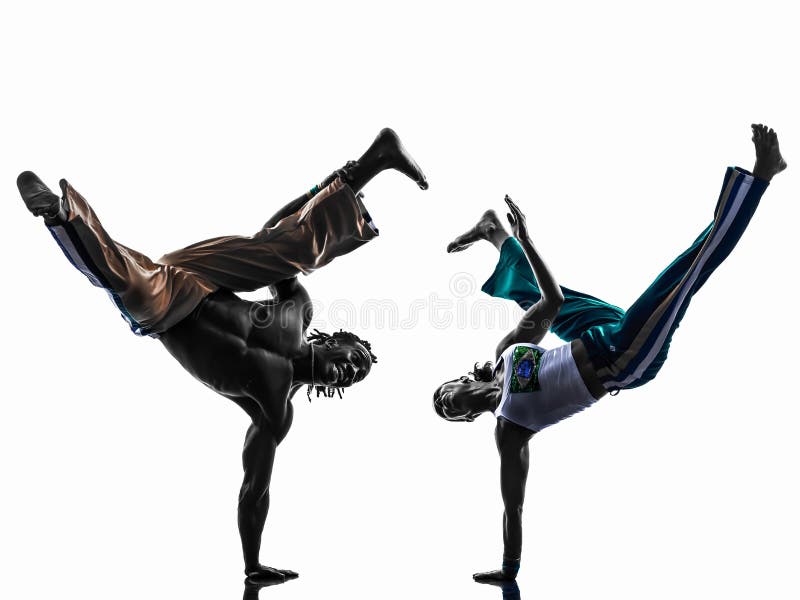 Dança dos dançarinos do capoeira dos pares silhueta imagem de stock royalty free Dança dos dançarinos do capoeira dos pares silhueta imagem de stock royalty free