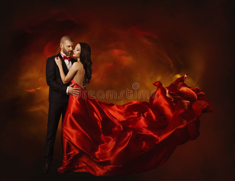 Dança elegante dos pares no amor, mulher na roupa vermelha e amante