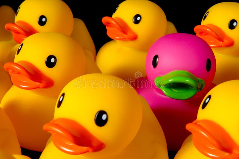 Dare to be different - rubber ducks on black