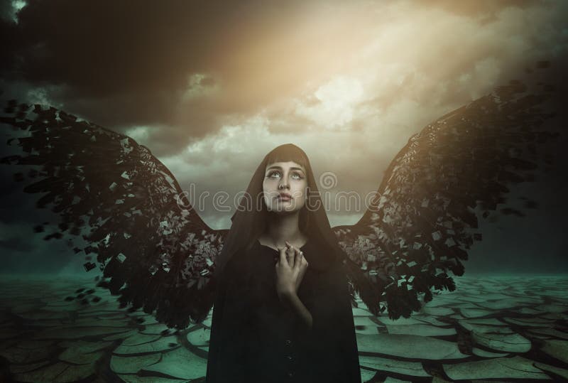 Dark angel with broken wings royalty free stock image Dark angel with broken wings royalty free stock image