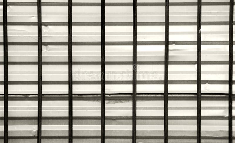 Dark Bars On A Background Of Gray Galvanized Sheet, The Intersection ...