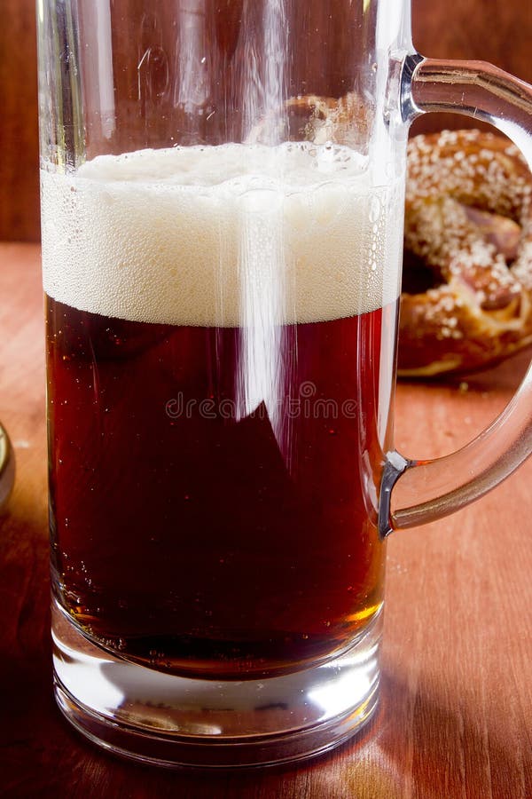 Dark beer in a glass glass stock image. Image of cold 72129123
