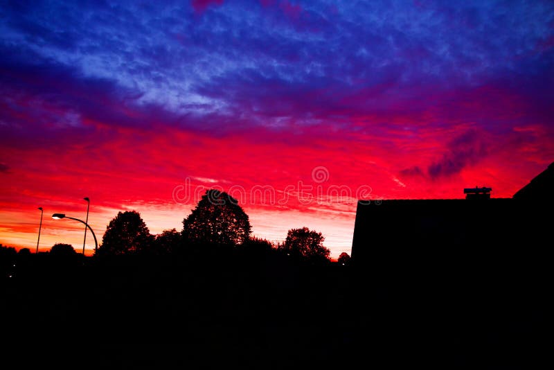 Dramatic Sky after a Storm Under a Dark Blue Brooding Sky with Alpine ...