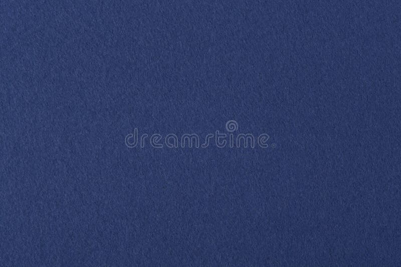 Felt texture background in navy blue color. Stock Photo