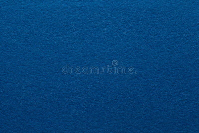 Dark blue felt texture abstract background paper