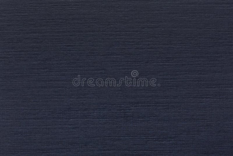 Dark blue paper texture.