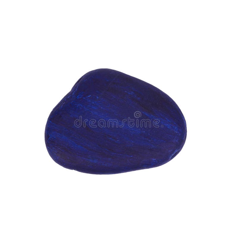 A dark blue painted pebble stone isolated on a white background. Painted curve stock images, royalty-free photos and pictures