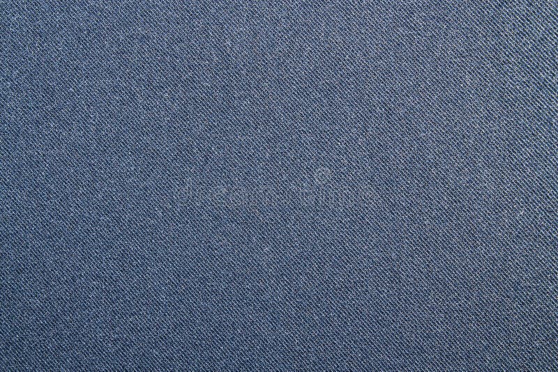 Dark Blue Tight Denim Background.Detailed Texture of Blue Denim Fabric with High Resolution