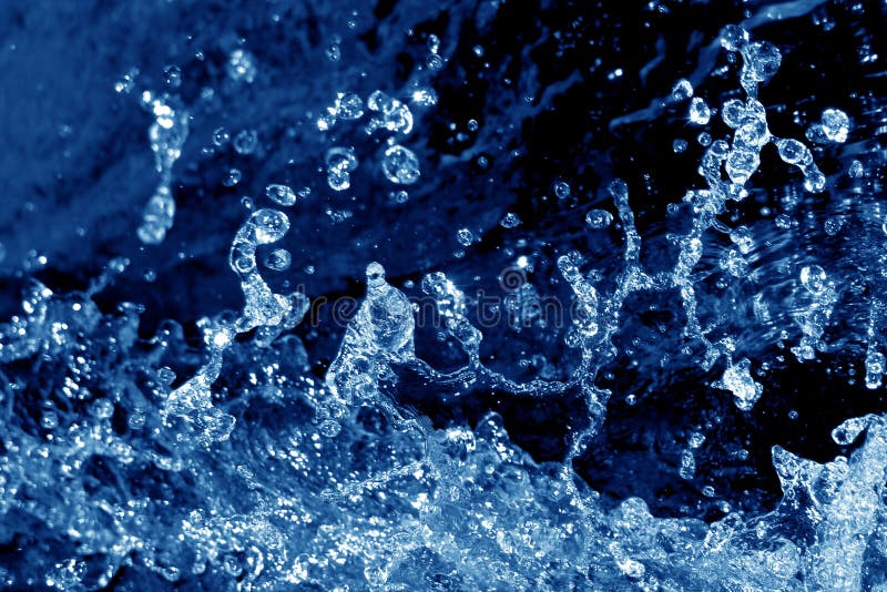 Dark blue water and drops close up detail