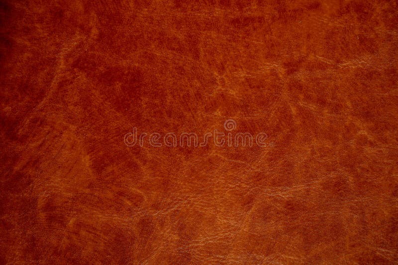 Dark brown genuine leather as a closeup background