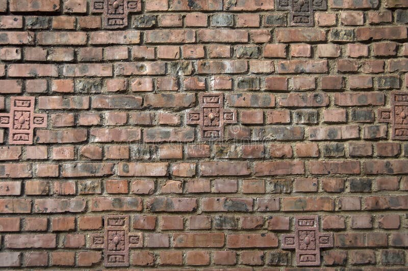 Dark brown red brick wall