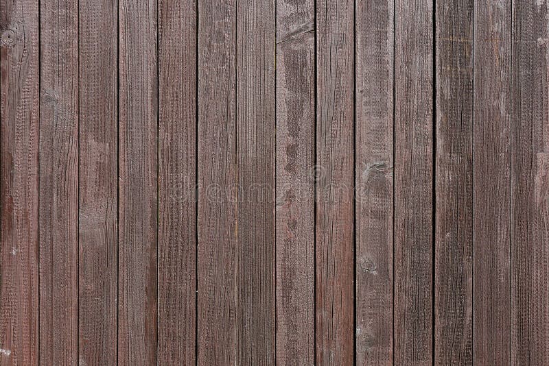 Dark brown weathered wooden fence
