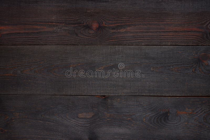 Dark-brown wooden textured background stock photos