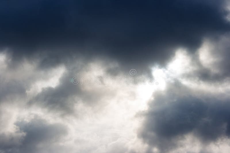Dark dense gloomy dramatic thundercloud stock images