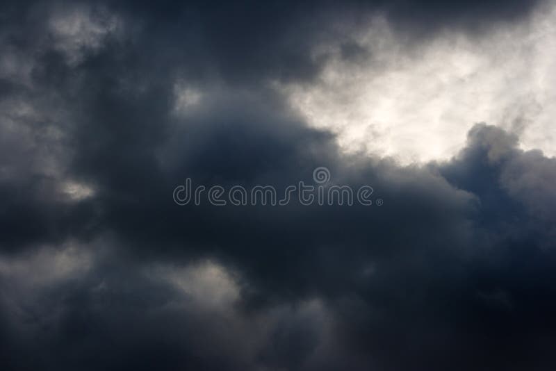 Dark dense gloomy dramatic thundercloud stock image