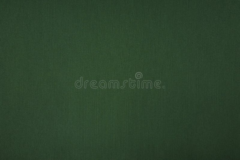 Dark green cotton fabric background