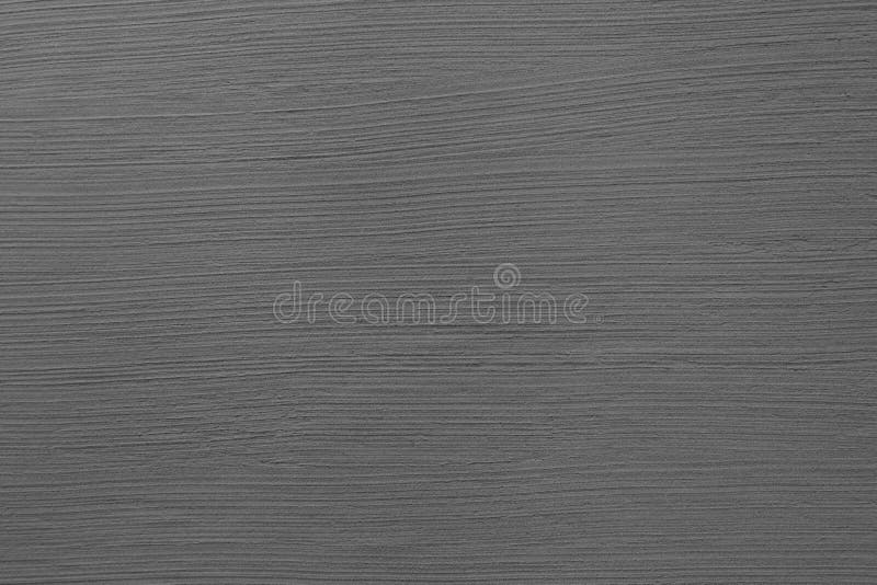 Dark grey cement wall with rustic natural brush stroke texture for abstract background and design purpose royalty free stock images