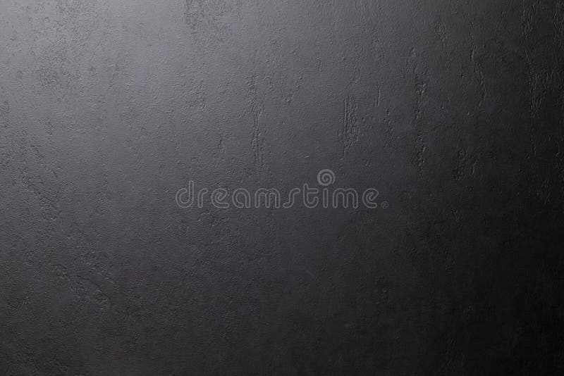 Dark grey stone background. Black slate texture