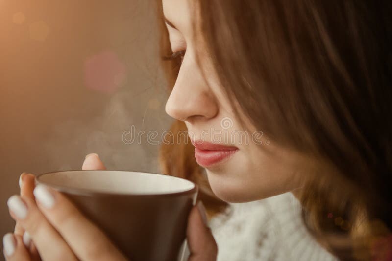 https://thumbs.dreamstime.com/b/dark-haired-woman-drinking-morning-coffee-closeup-girl-hot-63003552.jpg