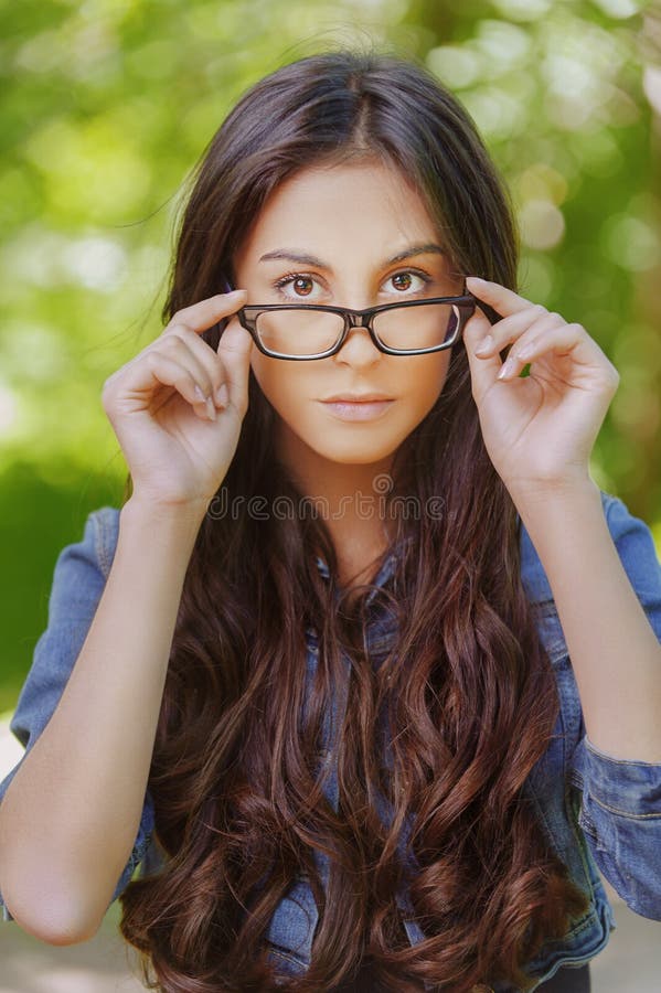 Dark-haired Young Woman in Glasses Stock Image - Image of hair, beauty:  28054667