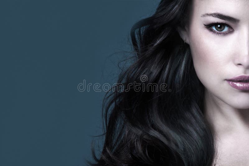 Dark long hair beauty woman portrait half face stock photography