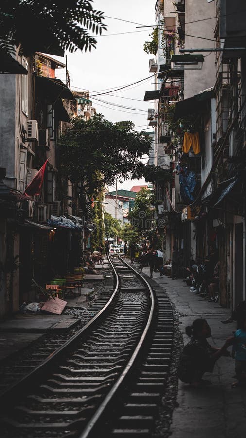 A dark and moody shot down the railway lines of the famous Train Street in North Vietnam royalty free stock images A dark and moody shot down the railway lines of the famous Train Street in North Vietnam royalty free stock images