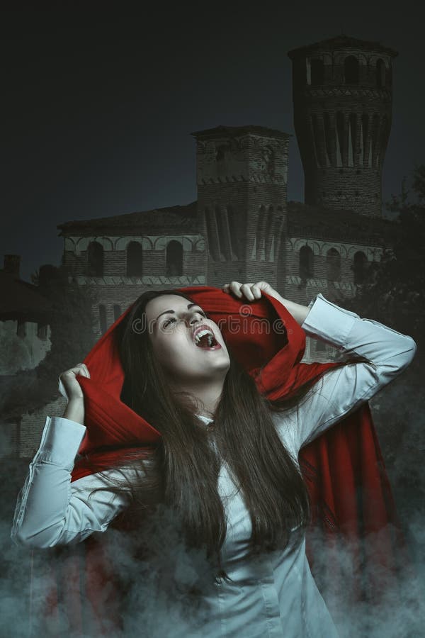 Dark portrait of a red hooded vampire