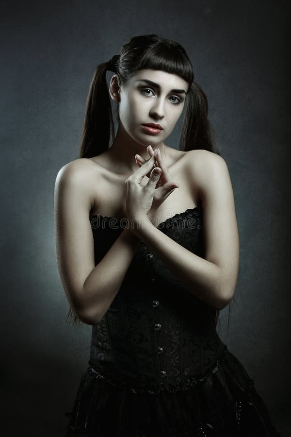 Dark portrait of young vampire