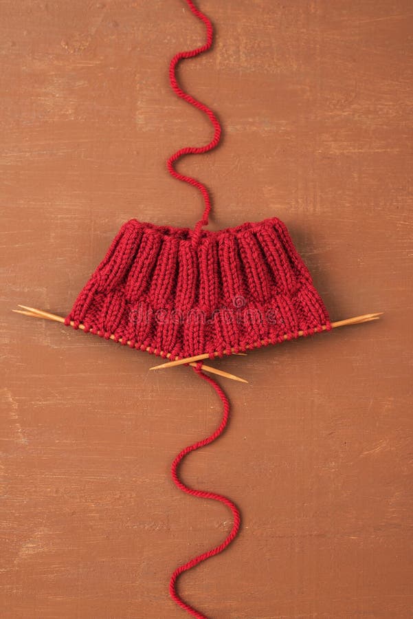 Background with red knitting