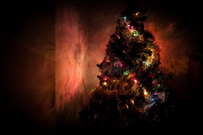 Dark Reflections of a Christmas Tree Stock Image - Image of tree, cores ...