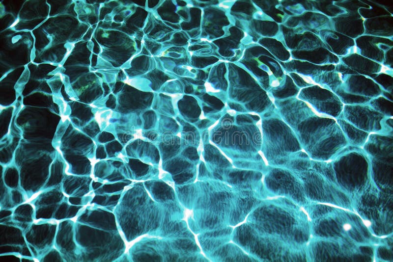 Dark Ripped Water in Swimming Pool with Sun Reflections Stock Photo