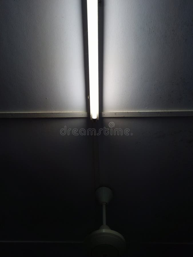 Dark room with light stock image. Image of light, floor 247516867