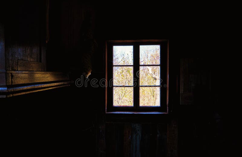 Dark Room with Sunlit Windows As an Abstract Background Stock Photo
