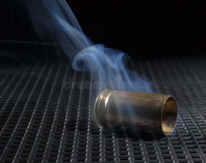 Smoking Bullet Casing Fired Out Handgun Stock Photo 1471522799