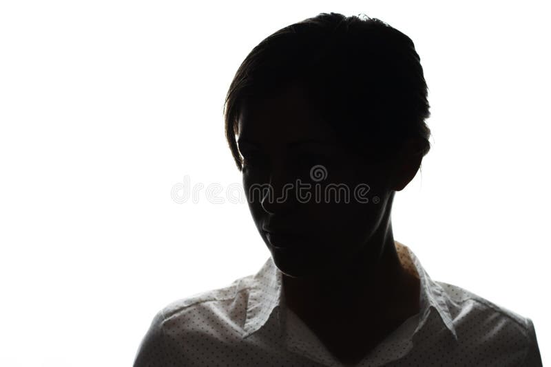 Dark silhouette of a young girl on white background, the concept of anonymity. Dark silhouette of a young girl on a white background, the concept of anonymity royalty free stock photography Dark silhouette of a young girl on white background, the concept of anonymity. Dark silhouette of a young girl on a white background, the concept of anonymity royalty free stock photography